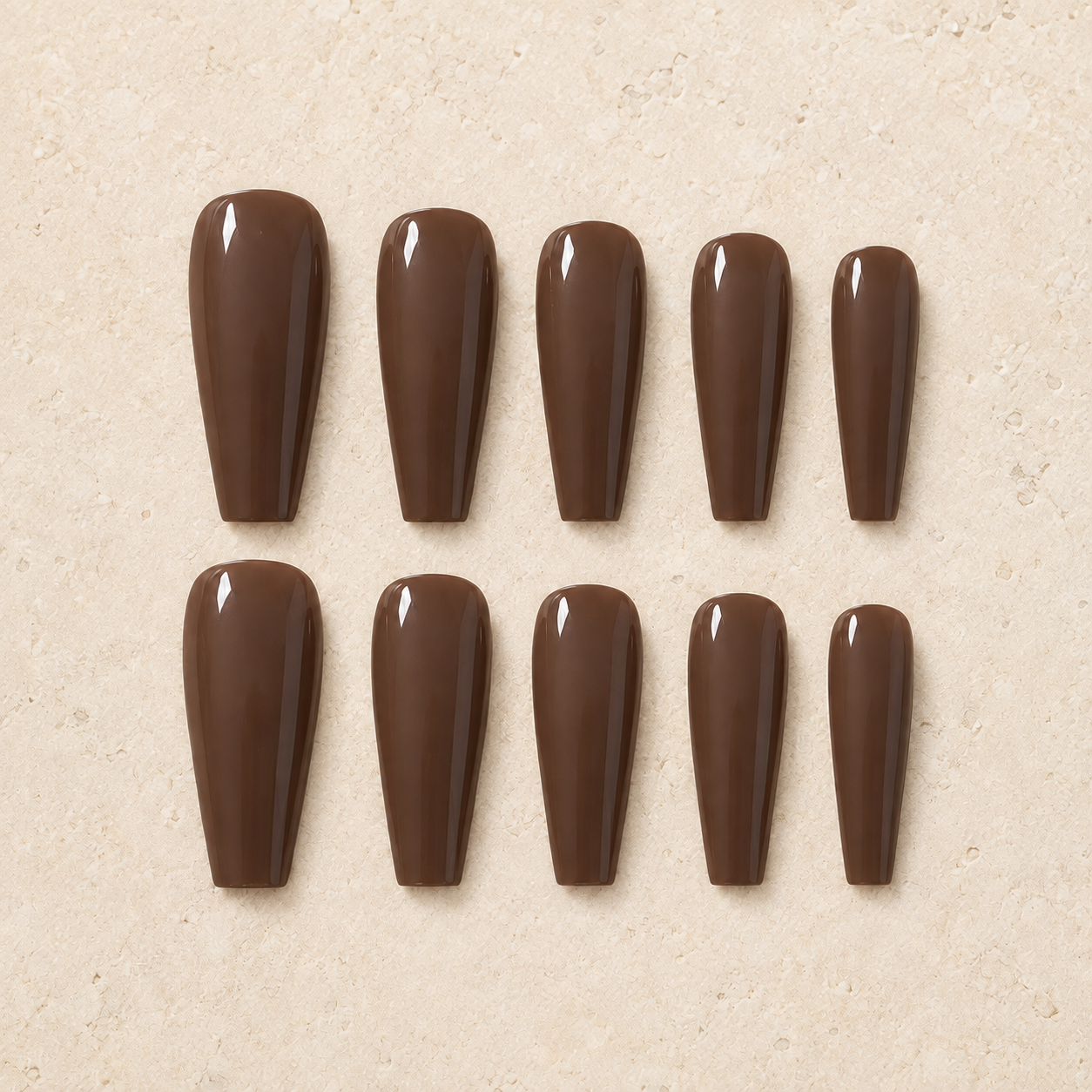 Cocoa Gloss press-on nail design.